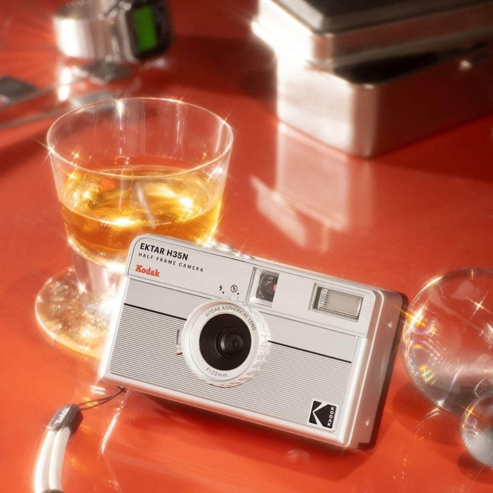 image:imageKODAK EKTAR H35N Half Frame Film Camera 35mm Reusable FocusFree Bulb Function Builtin Star Filter Coated Improved Lens Film amp AAA Battery are not Included Striped Black Premium KitStriped Silver